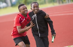 Two boys running the relay