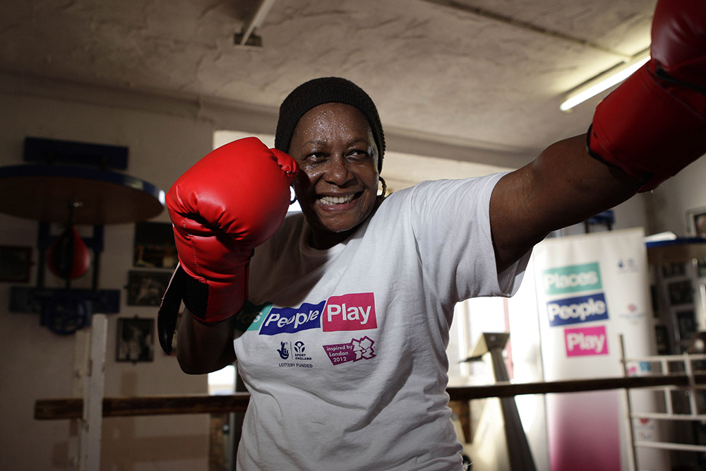 A lady boxing 