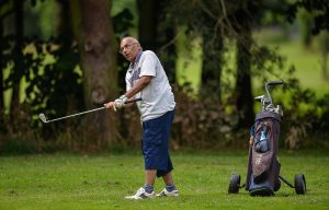 Man playing golf