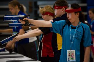 A young lady shooting