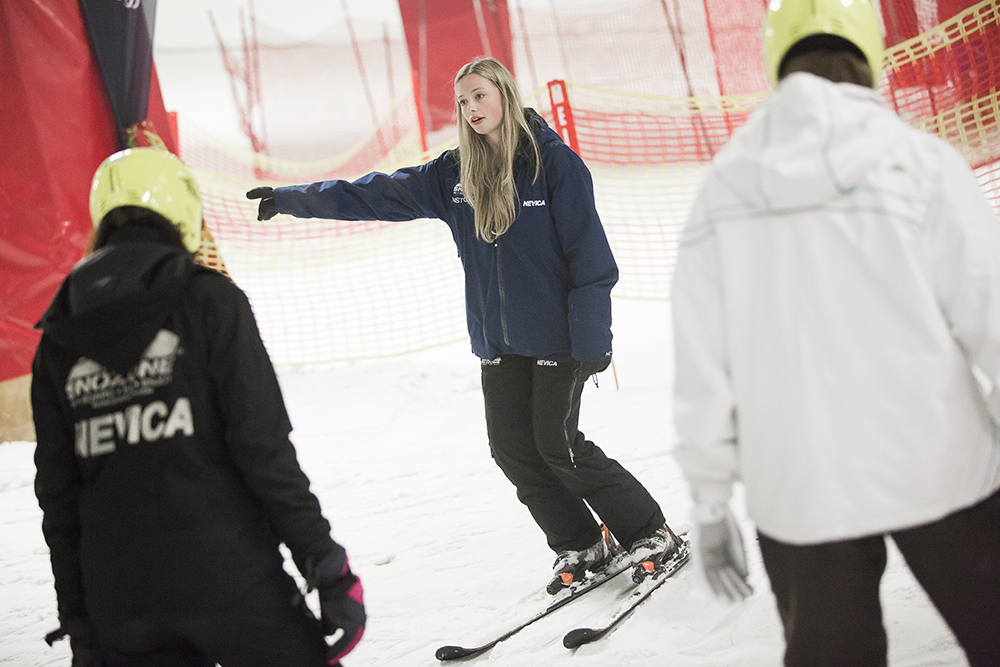 Skiers and snowboarders at SnoZone in Milton Keynes